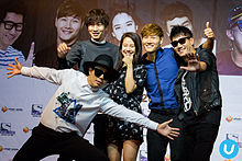 https://upload.wikimedia.org/wikipedia/commons/thumb/0/0c/Running_Man_Fan_Meeting_Asia_Tour_2014_Season_2.jpg/220px-Running_Man_Fan_Meeting_Asia_Tour_2014_Season_2.jpg