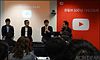 https://upload.wikimedia.org/wikipedia/commons/thumb/1/10/SOF_%26_Ssinnim_%26_Great_Library_%28Daedoseogwan%29_YouTube_Creator_panel_discussion.jpg/100px-SOF_%26_Ssinnim_%26_Great_Library_%28Daedoseogwan%29_YouTube_Creator_panel_discussion.jpg