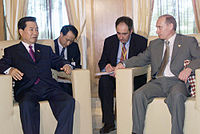https://upload.wikimedia.org/wikipedia/commons/thumb/1/15/Vladimir_Putin_at_APEC_Summit_in_Brunei_15-16_November-6.jpg/200px-APECVladimir_Putin_at_APEC_Summit_in_Brunei_15-16_November-6.jpg