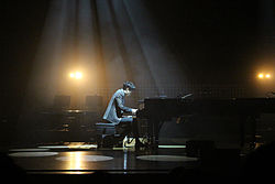 https://upload.wikimedia.org/wikipedia/commons/thumb/4/40/Yoonhan_at_the_concert_%E2%80%98The_Romantist%E2%80%99_in_Gwacheon.jpg/250px-Yoonhan_at_the_concert_%E2%80%98The_Romantist%E2%80%99_in_Gwacheon.jpg