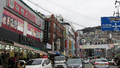 https://upload.wikimedia.org/wikipedia/commons/thumb/a/a0/A_Street_in_Jung_District%2C_Busan.png/120px-A_Street_in_Jung_District%2C_Busan.png