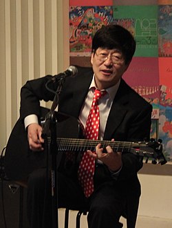 https://upload.wikimedia.org/wikipedia/commons/thumb/a/a2/Kim_Chang-wan_%28cropped%29.jpg/250px-Kim_Chang-wan_%28cropped%29.jpg