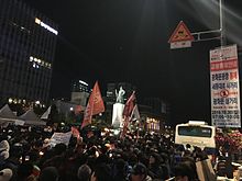 https://upload.wikimedia.org/wikipedia/commons/thumb/c/c7/Protest_for_resign_of_Park.jpg/220px-Protest_for_resign_of_Park.jpg